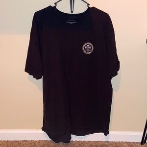 Black Vans t-shirt.